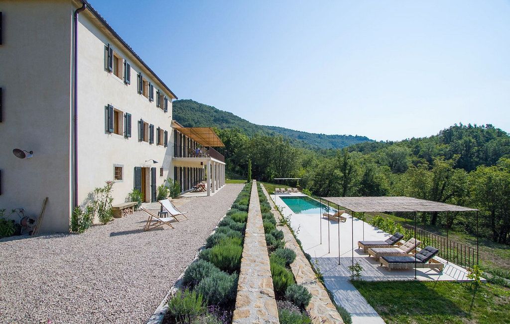 Villa Robur after restoration — swimming pool and estate overview