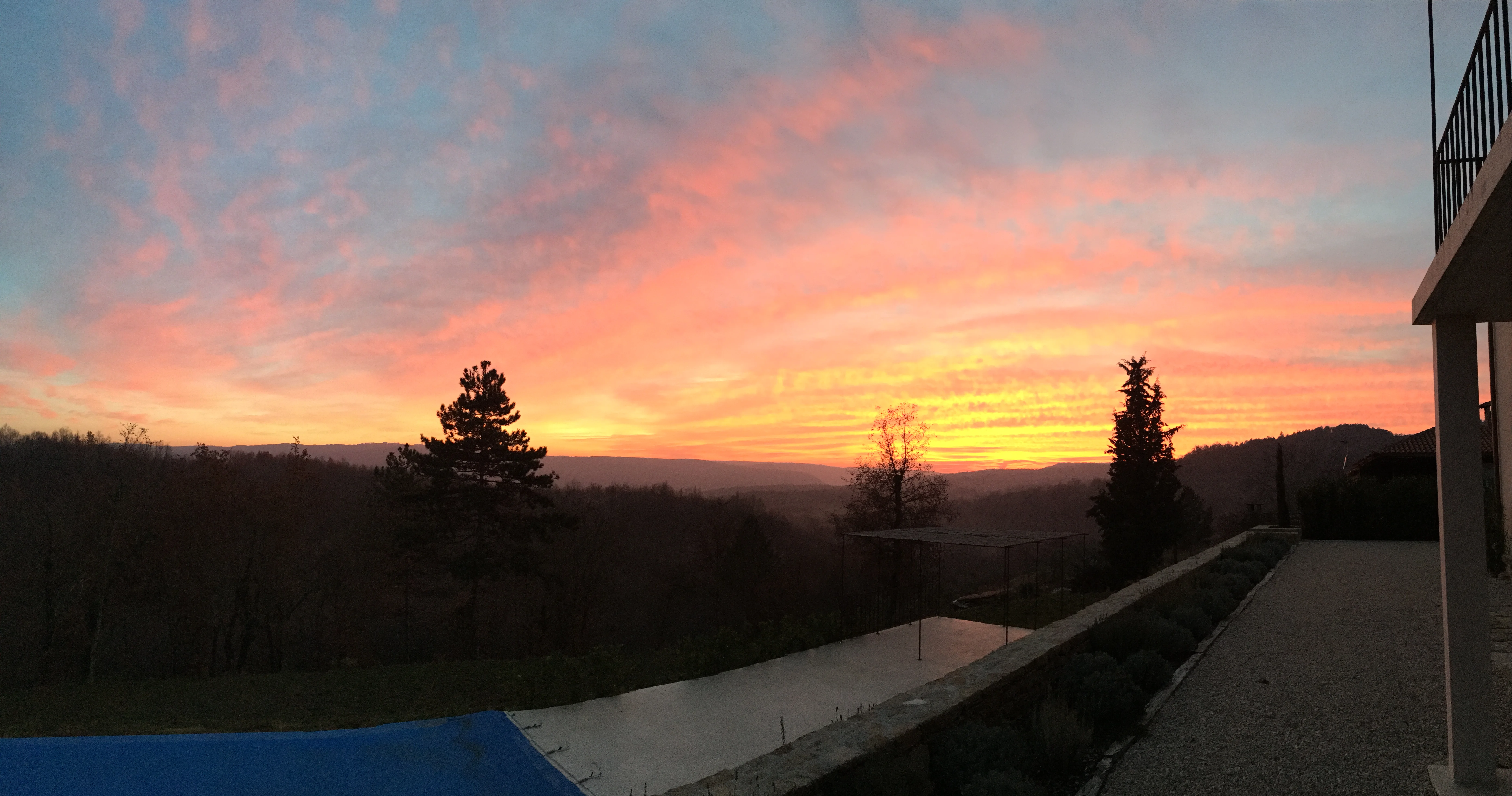 Spectacular evening sky at sunset over the estate