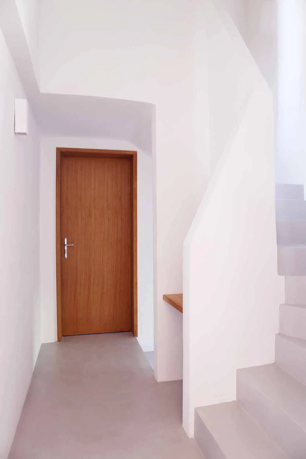 Staircase and interior door in warm amber light